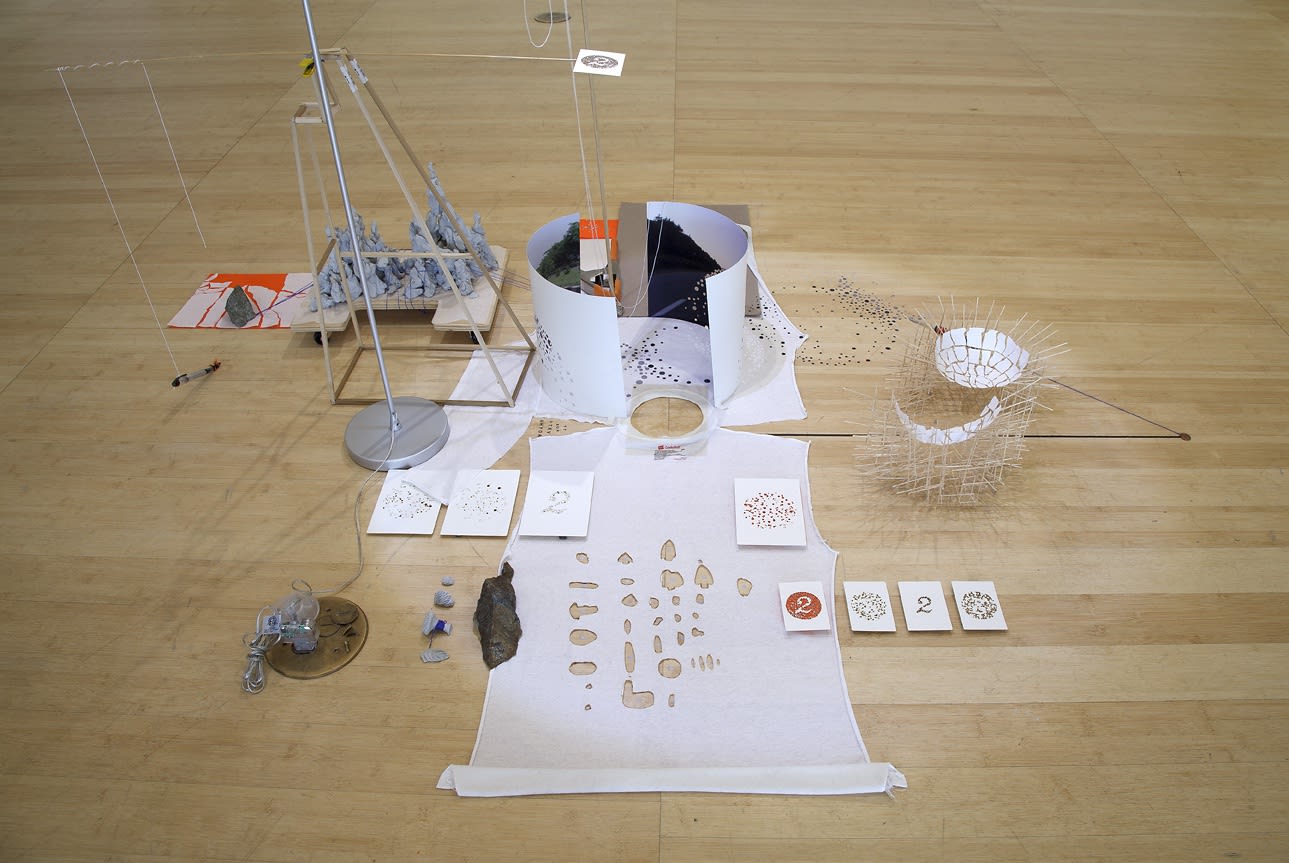 Image of a sculpture of objects on the floor