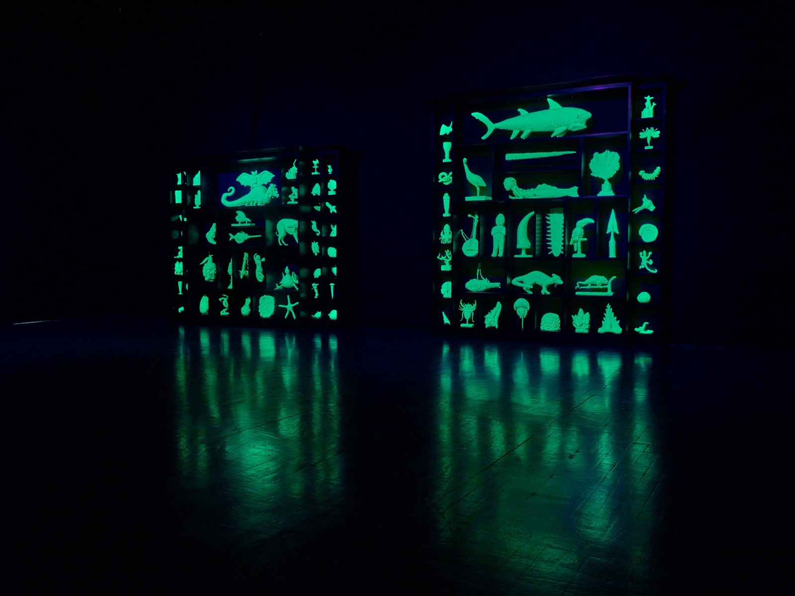 image of Mark Dion sculptures glowing in the dark