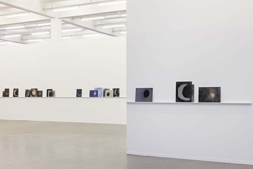 Image of Lisa Oppenheim photographs installation of moons