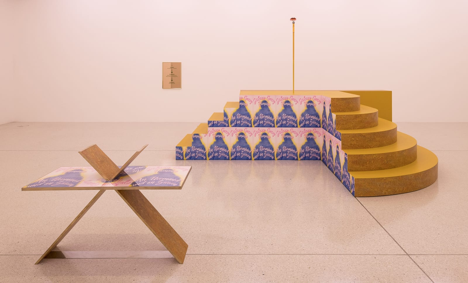 Image of Slavs and Tatars installation of stage and sculptures