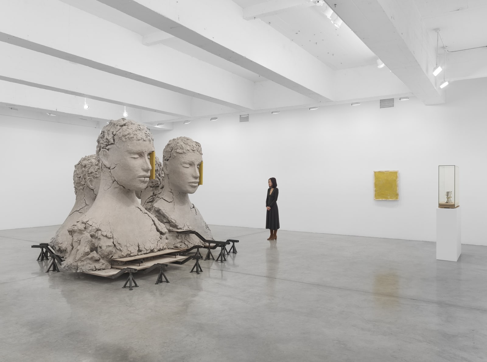 Manders large sculpture installation of four heads