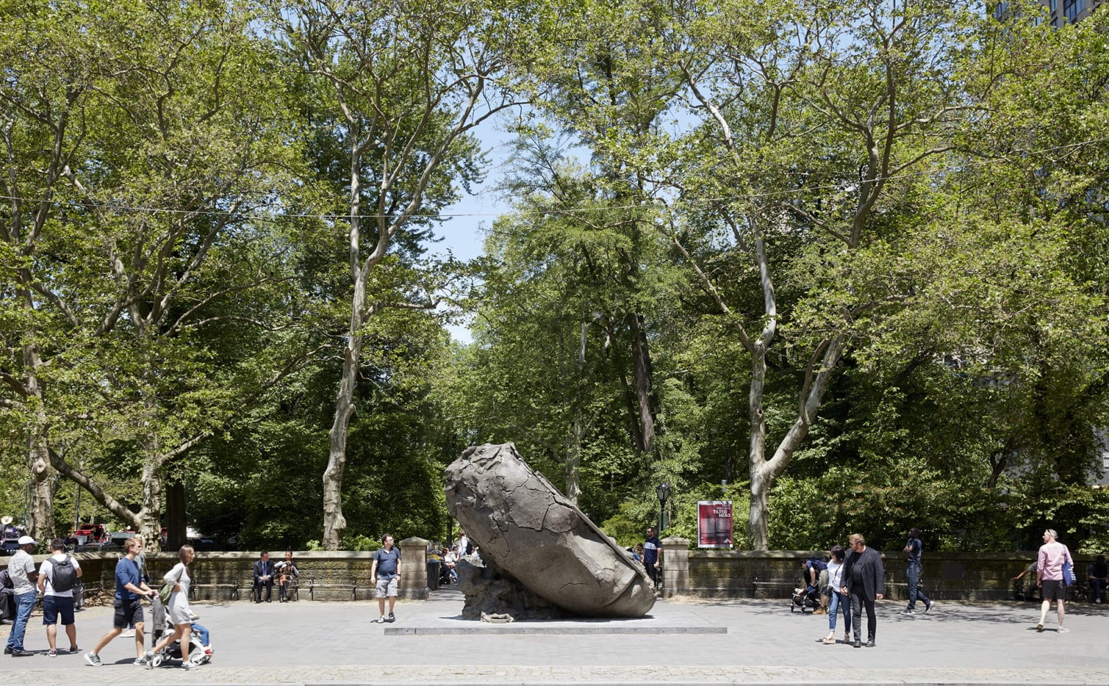 image of Mark Manders tilted bronze head in central park