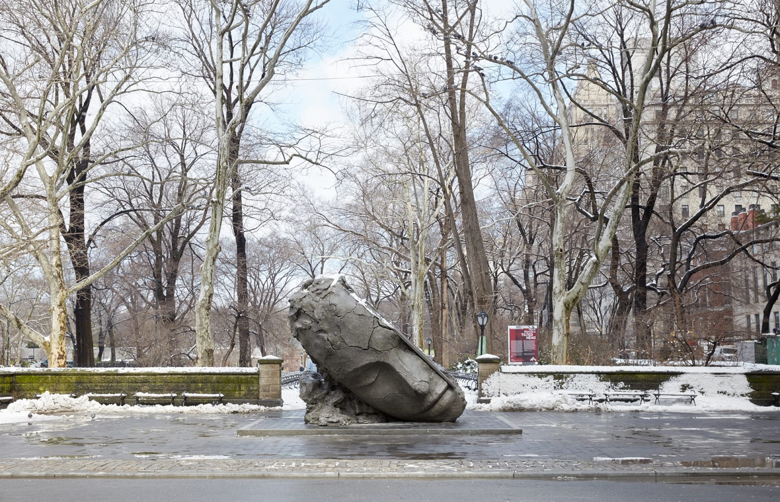 image of Mark Manders tilted bronze head in central park