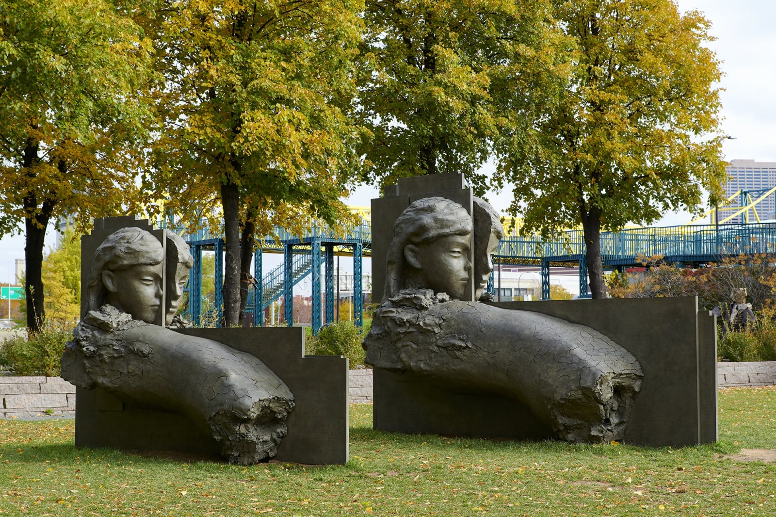 image of Mark Manders large bronze sculpture of figures in garden