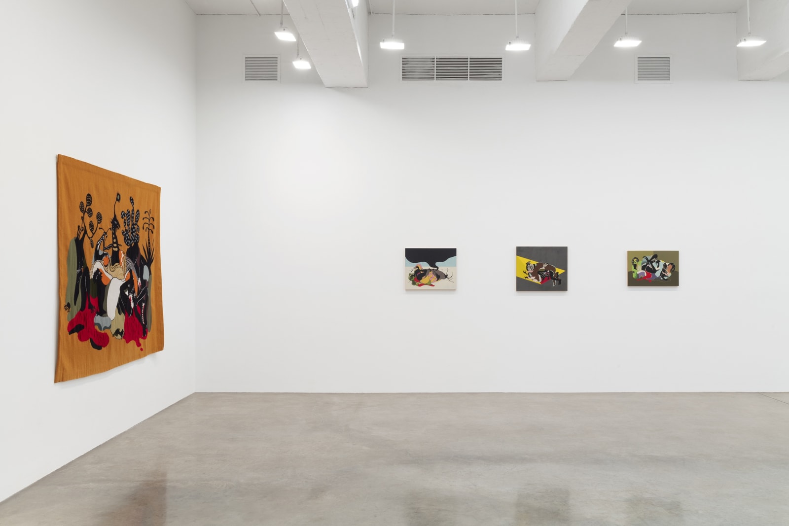 installation view of tapestries and paintings