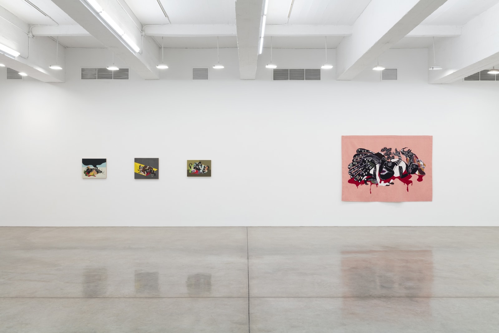 installation view of tapestries and paintings