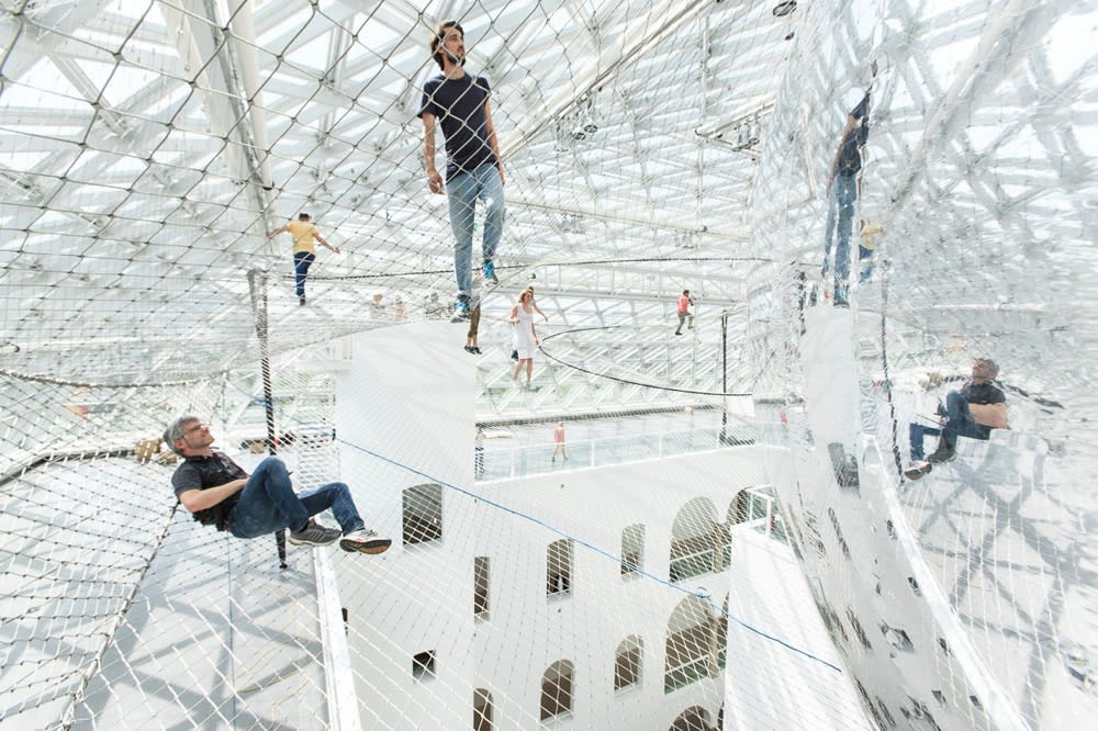 image of Saraceno hanging nets with people walking on them