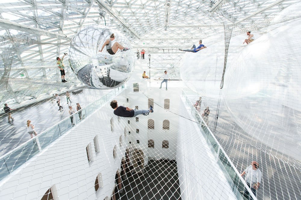 image of Saraceno hanging nets with people walking on them