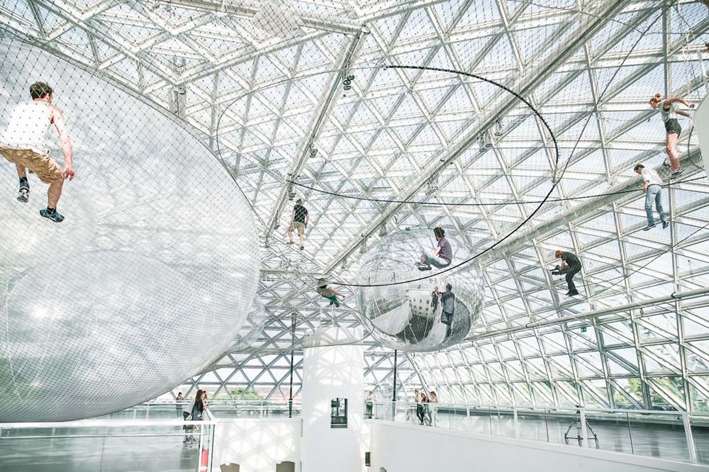 image of Saraceno hanging nets with people walking on them