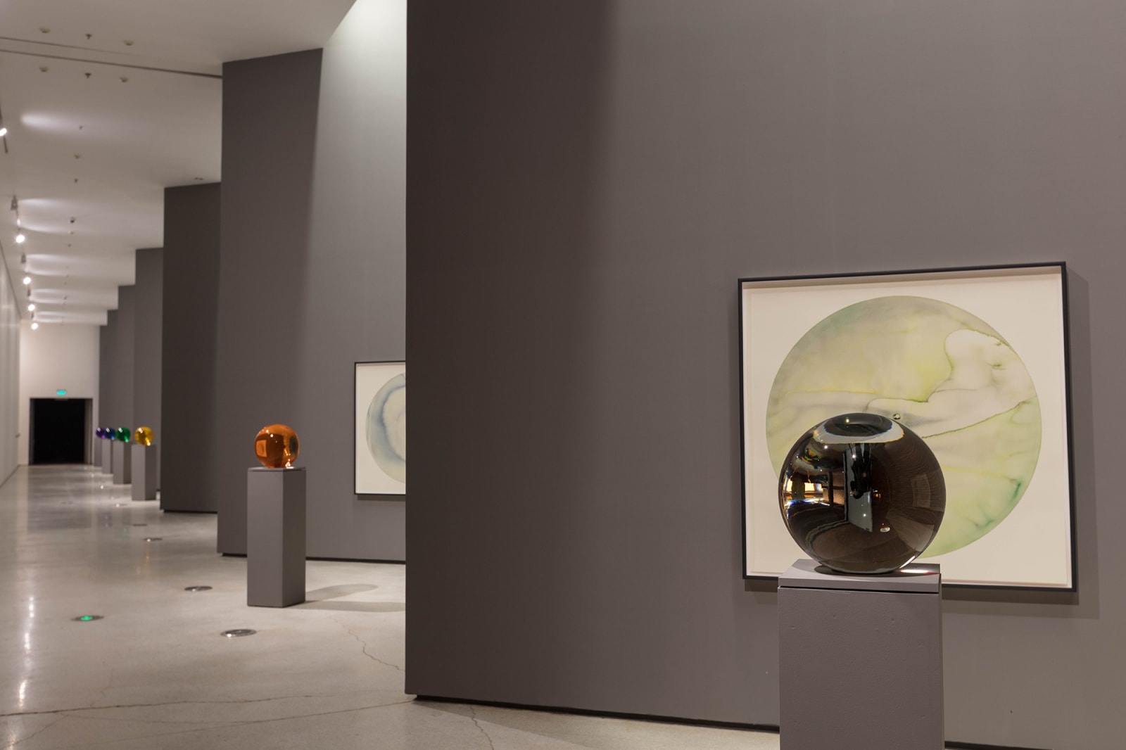 image of circular watercolors and circular crystal sphere