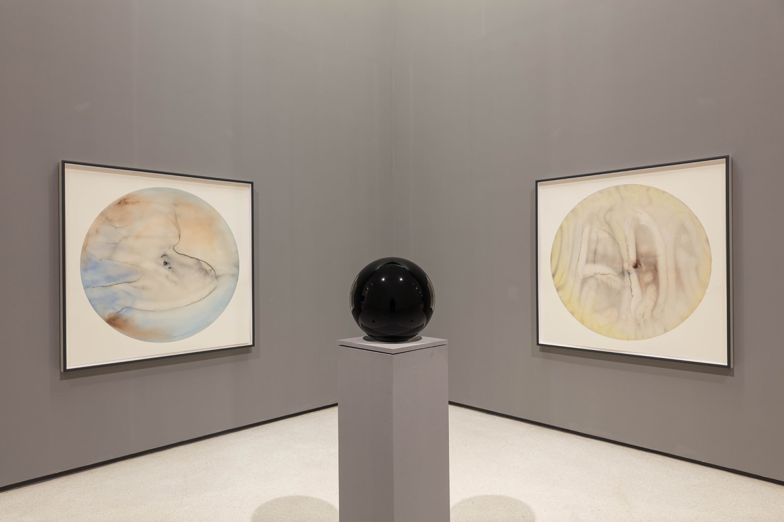 image of circular watercolors and circular crystal sphere