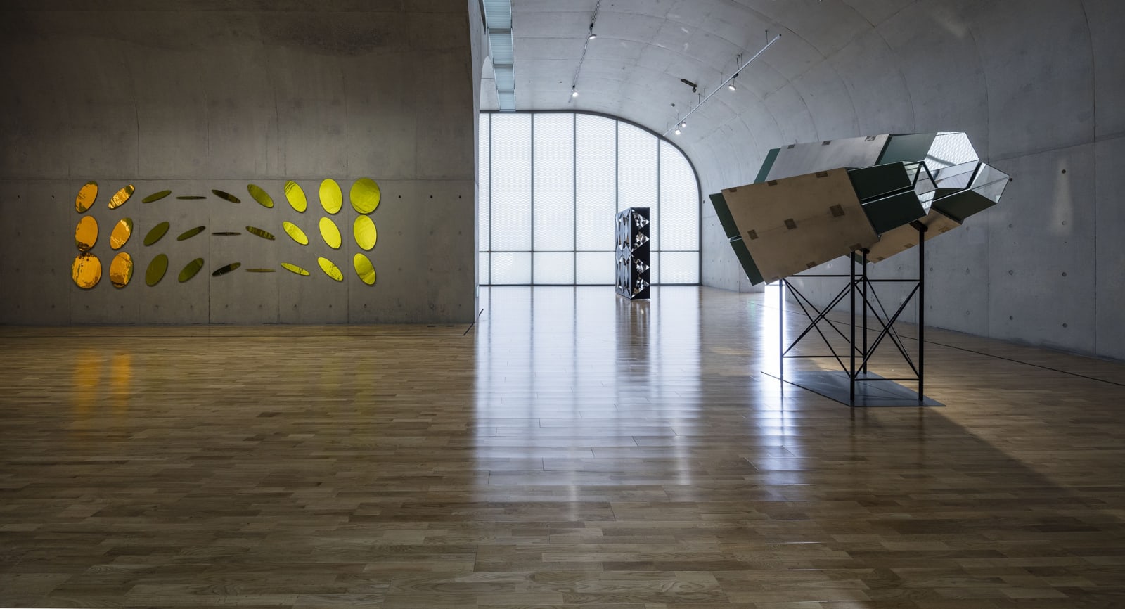 image of installation of yellow mirror discs