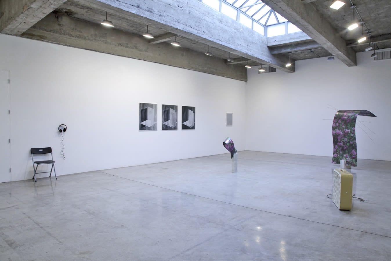 Installation view of Maybe it's the light that has to change and not much else.