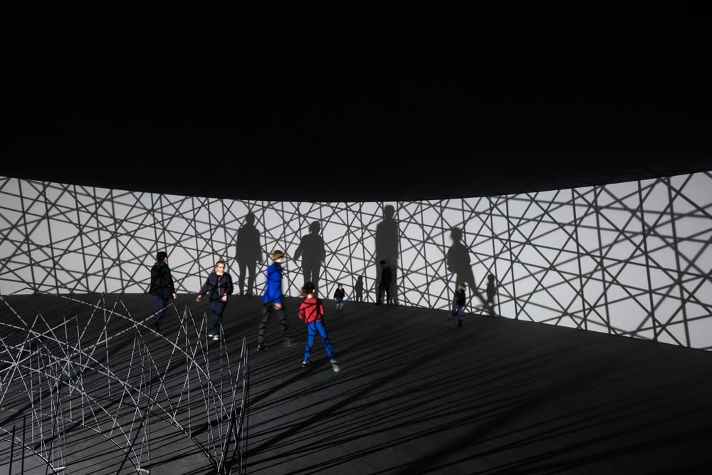image of Olafur Eliasson light and shadow effect on surrounding walls