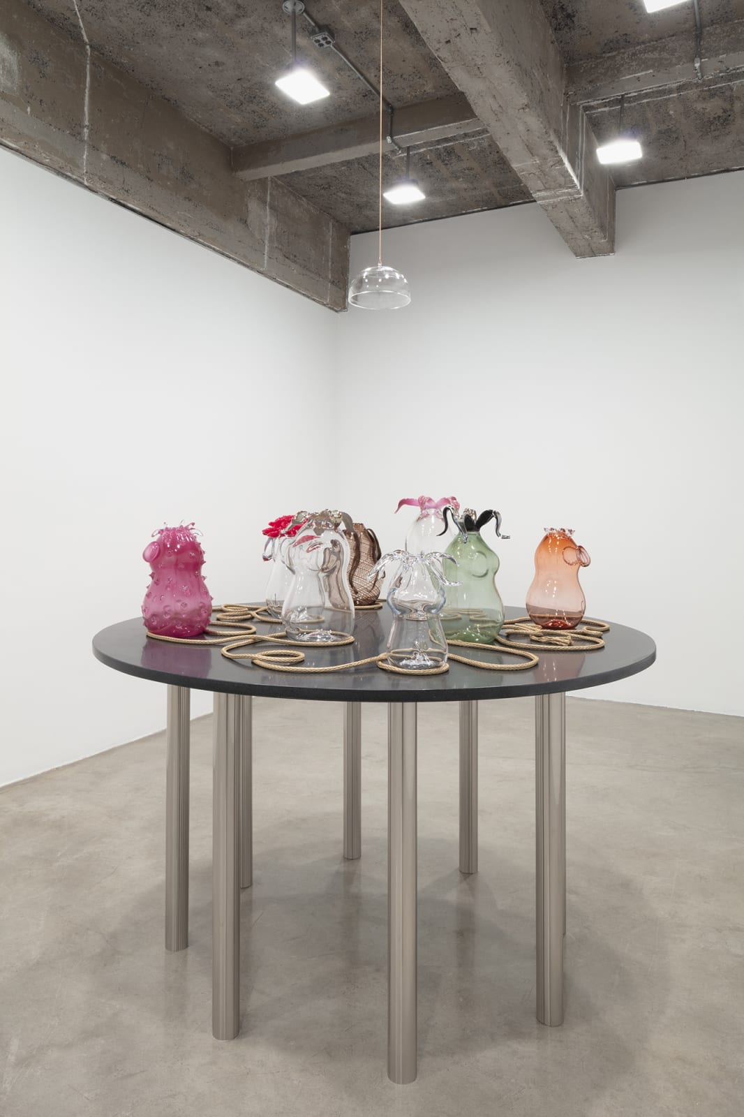 Akashi sculpture, glass objects on table