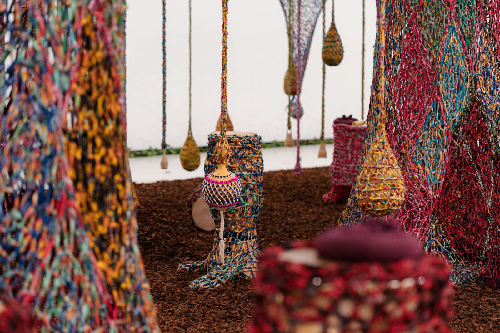Installation view of ERNESTO NETO: Nosso Barco Tambor Terra [our boat drum earth].