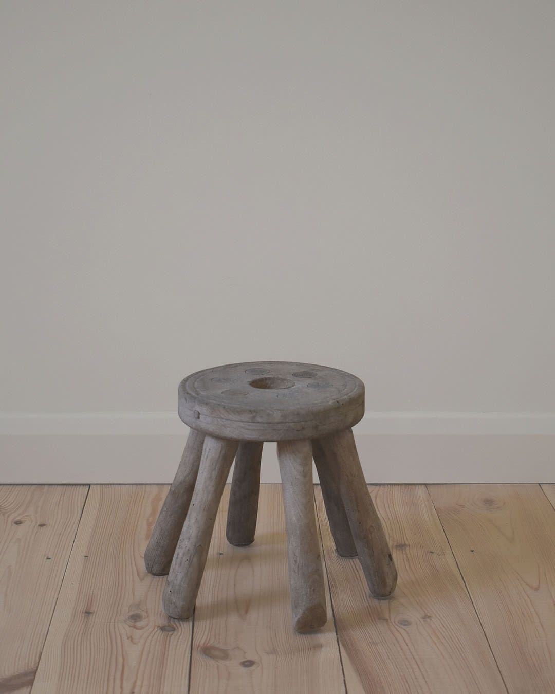 SIX LEGGED WOODEN STOOL