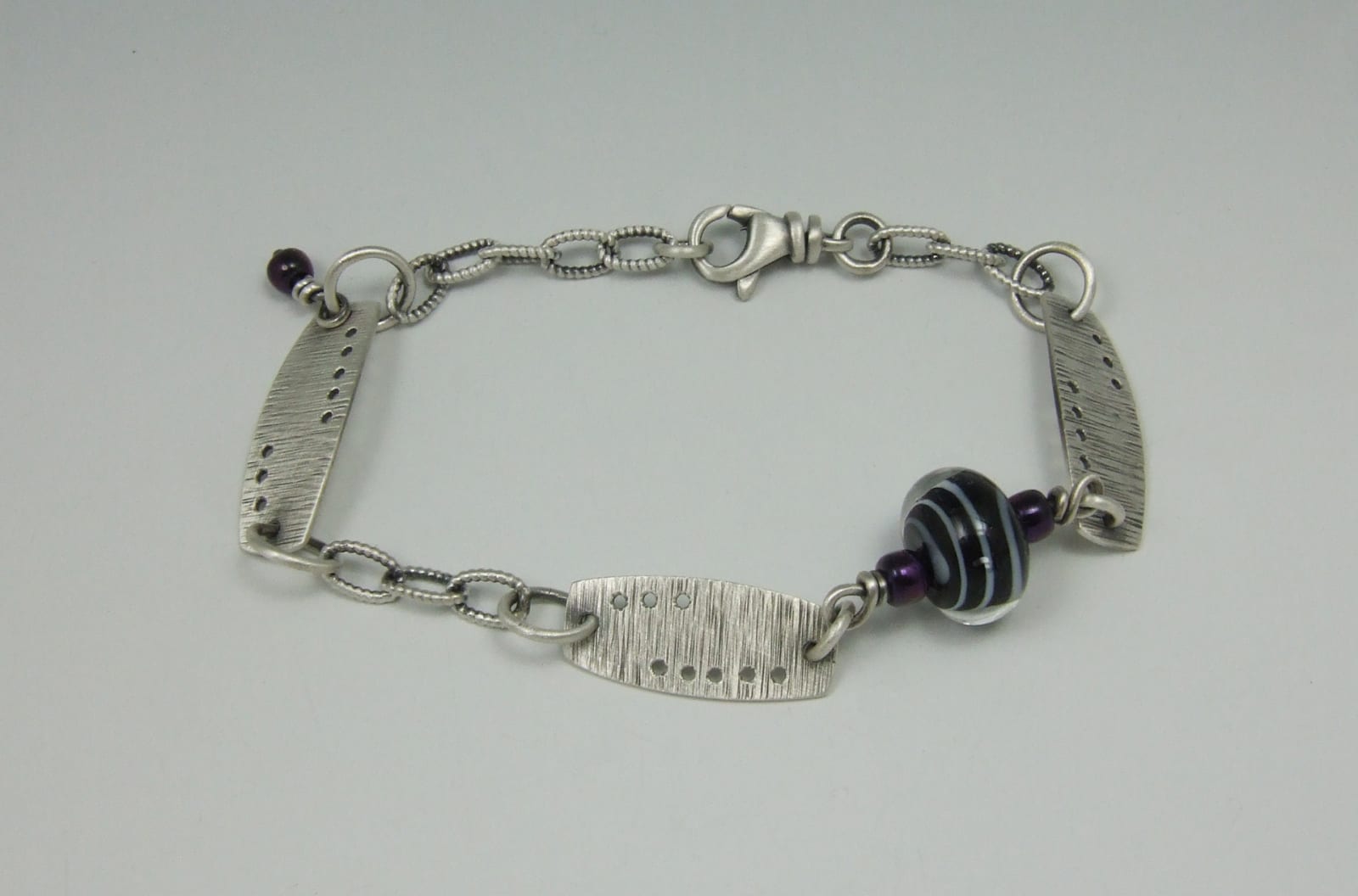 Pam Pastoric, Sterling Silver Bracelet with Black Spiral Glass bead