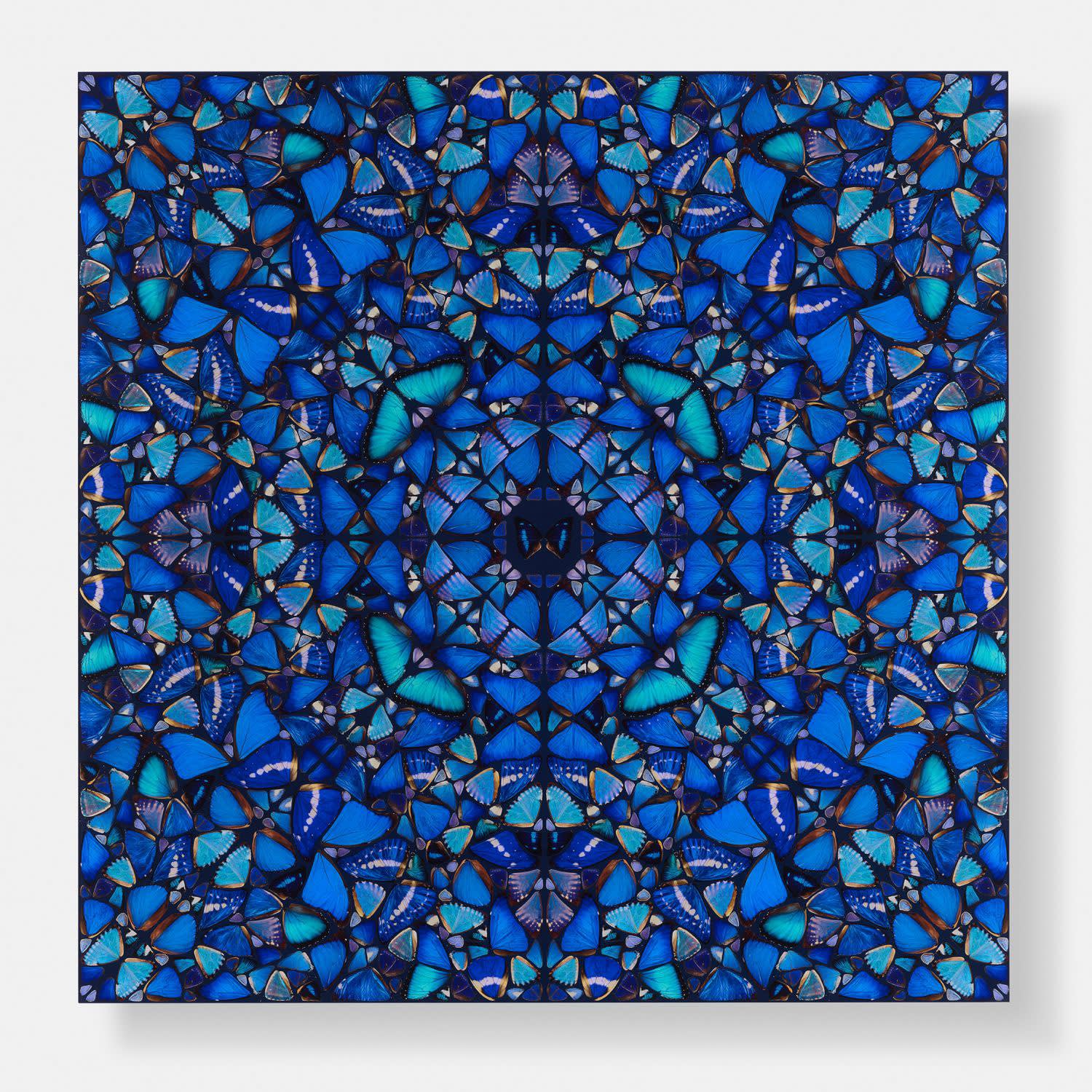 Square format butterfly mosaic in blue toned kaleidoscope style