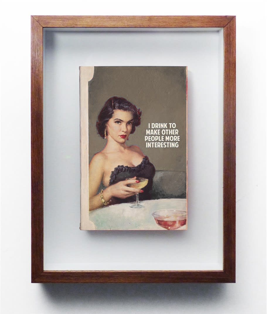 Connor Brothers: I Drink - Hand painted paperback novel, painted in beige, depicting a woman sat at a bar drinking, inspired by a vintage book cover. It has text that reads "I Drink To Make Other People More Interesting".