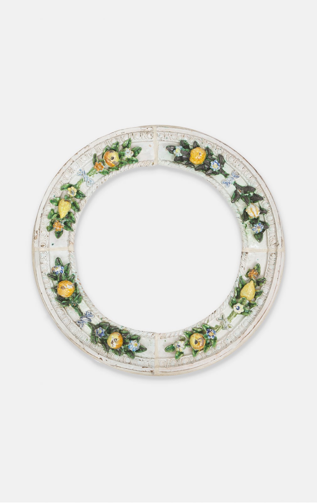 Girolamo della Robbia (1488-1566) (Workshop of), Roundel decorated with a garland of fruits and flowers, 16th century