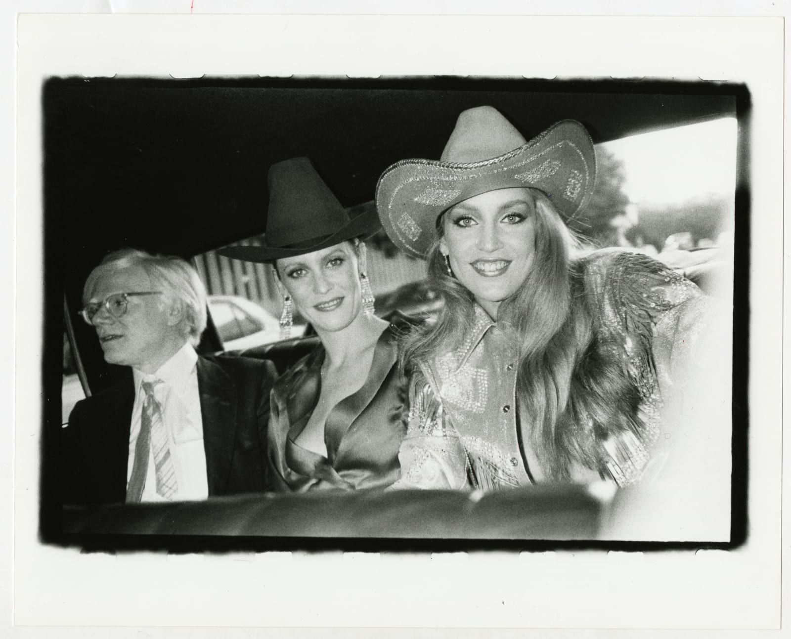 <a href="/content/feature/4399/detail/image43107/" class="pageload-link-type-popup-enabled-content"><p><span class="cms_size_1"><em>Andy, Cindy and Jerry Hall, Houston,</em> 1980</span><br /><span class="cms_size_1">Vintage gelatin silver print</span><br /><span class="cms_size_1">20.3 x 25.4 cm (8 x 10 in)</span></p></a>