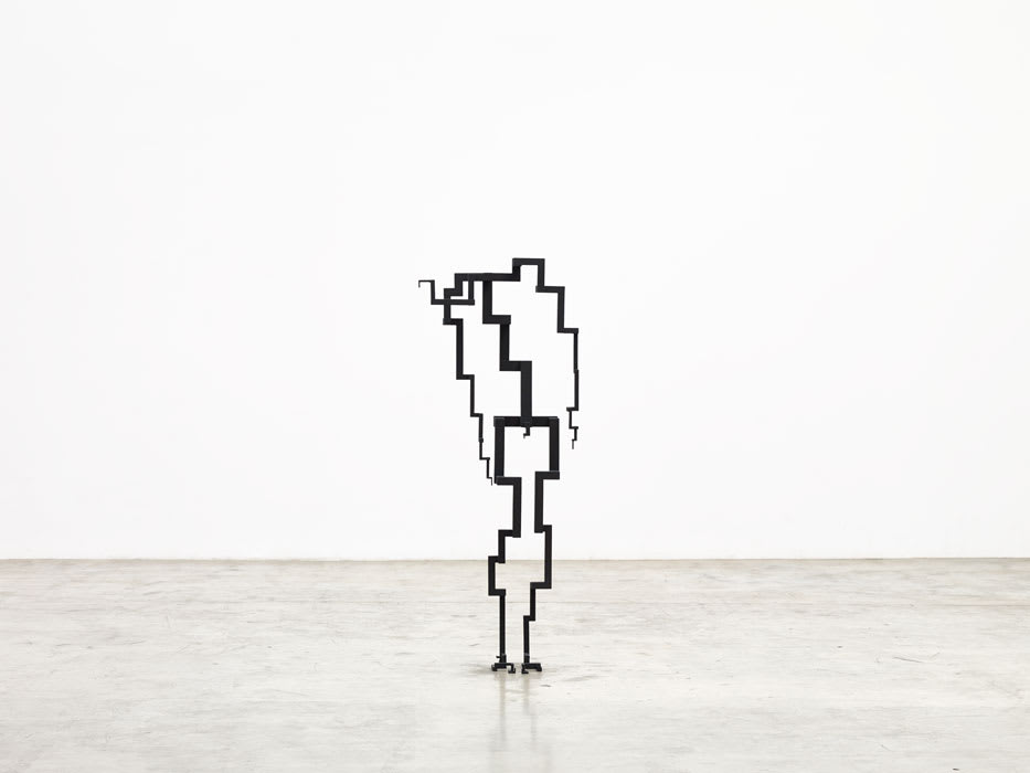Two life-sized sculptures by Antony Gormley on display at Fred Meijer
