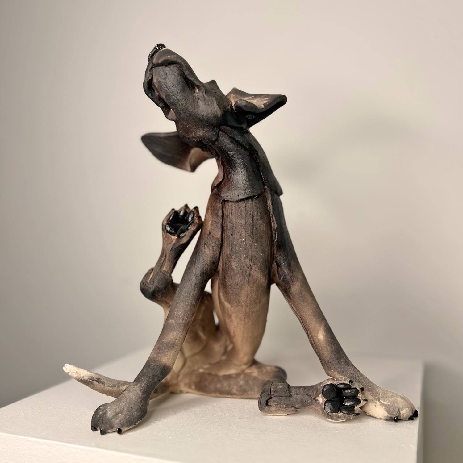Virginia Dowe Edwards, Seated Scratching Smoky Dog, 2025