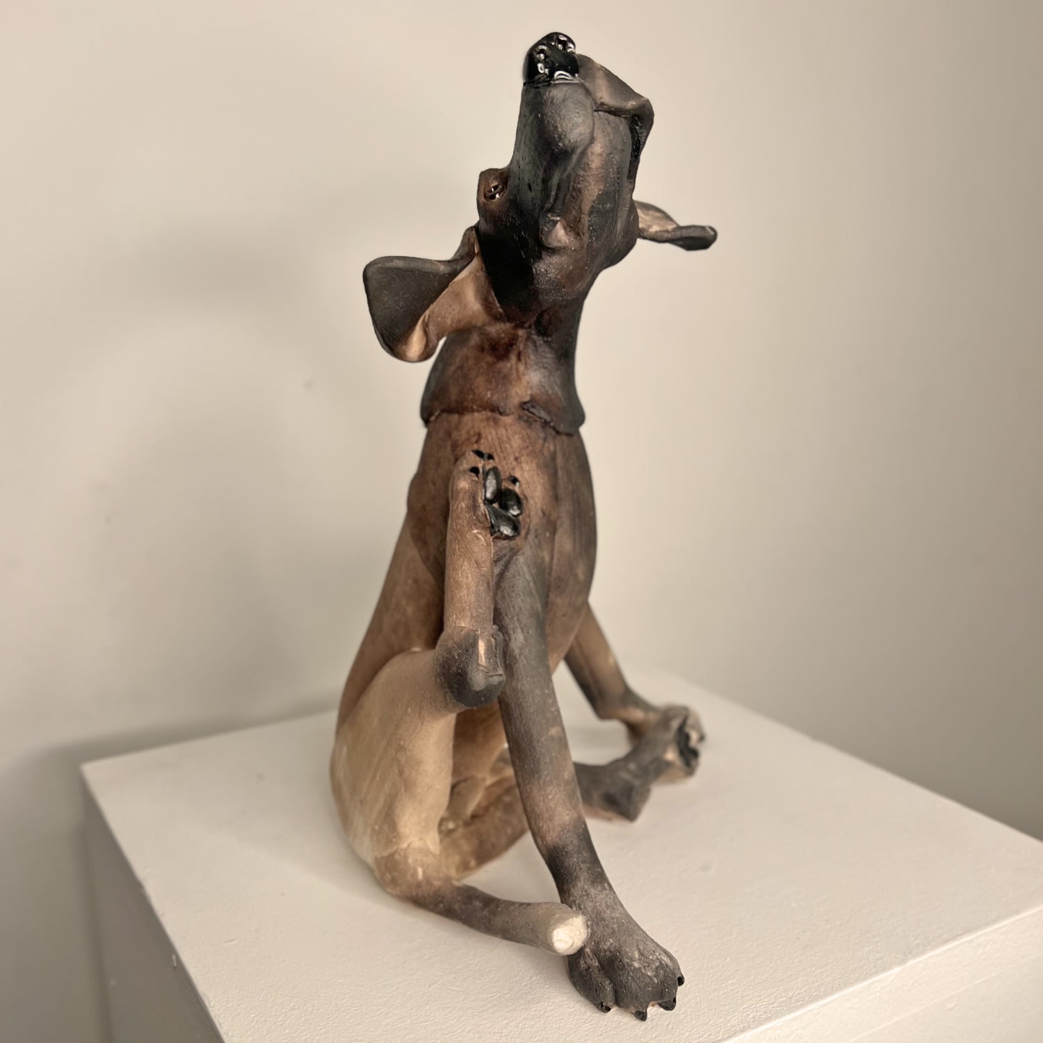 Virginia Dowe Edwards, Seated Scratching Smoky Dog, 2025