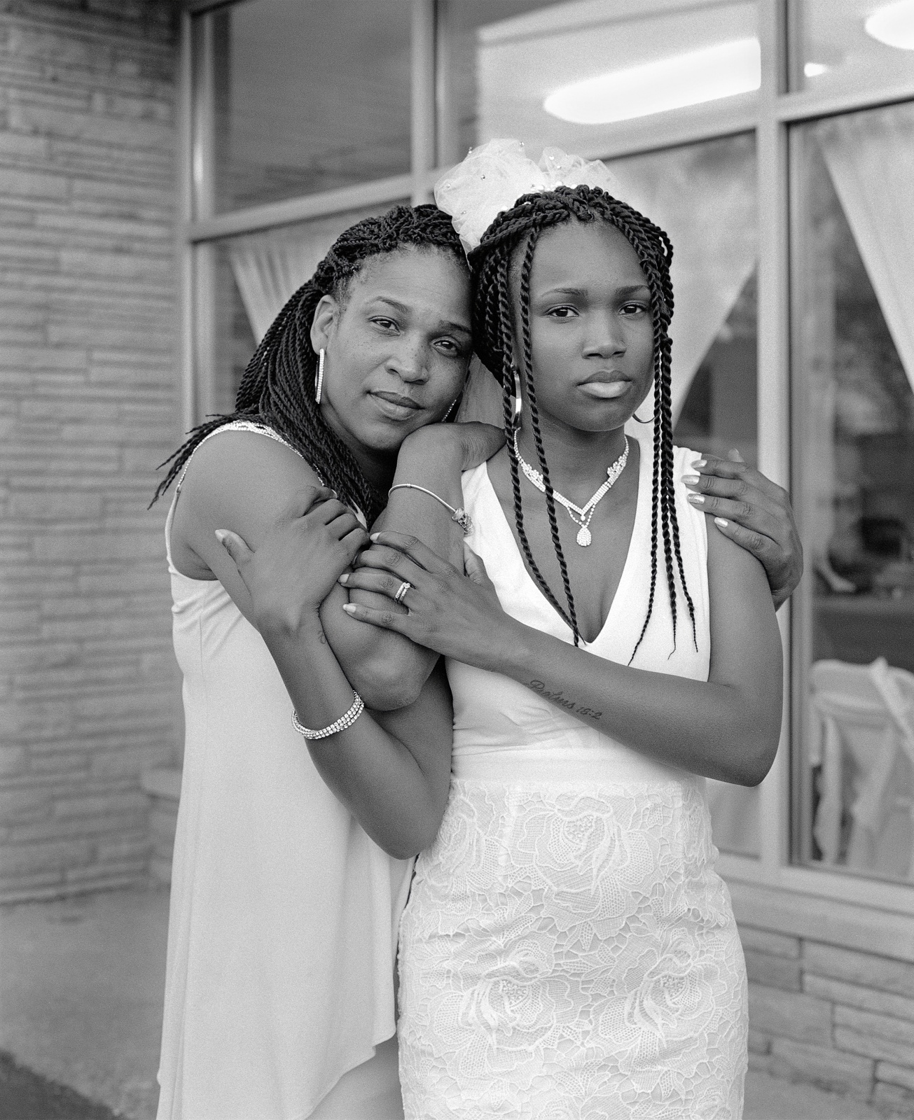 LaToya Ruby Frazier, Andrea Holding Her Daughter Nephratiti Outside the Social Network Banquet Hall, Flint, Michigan, 2016-2017