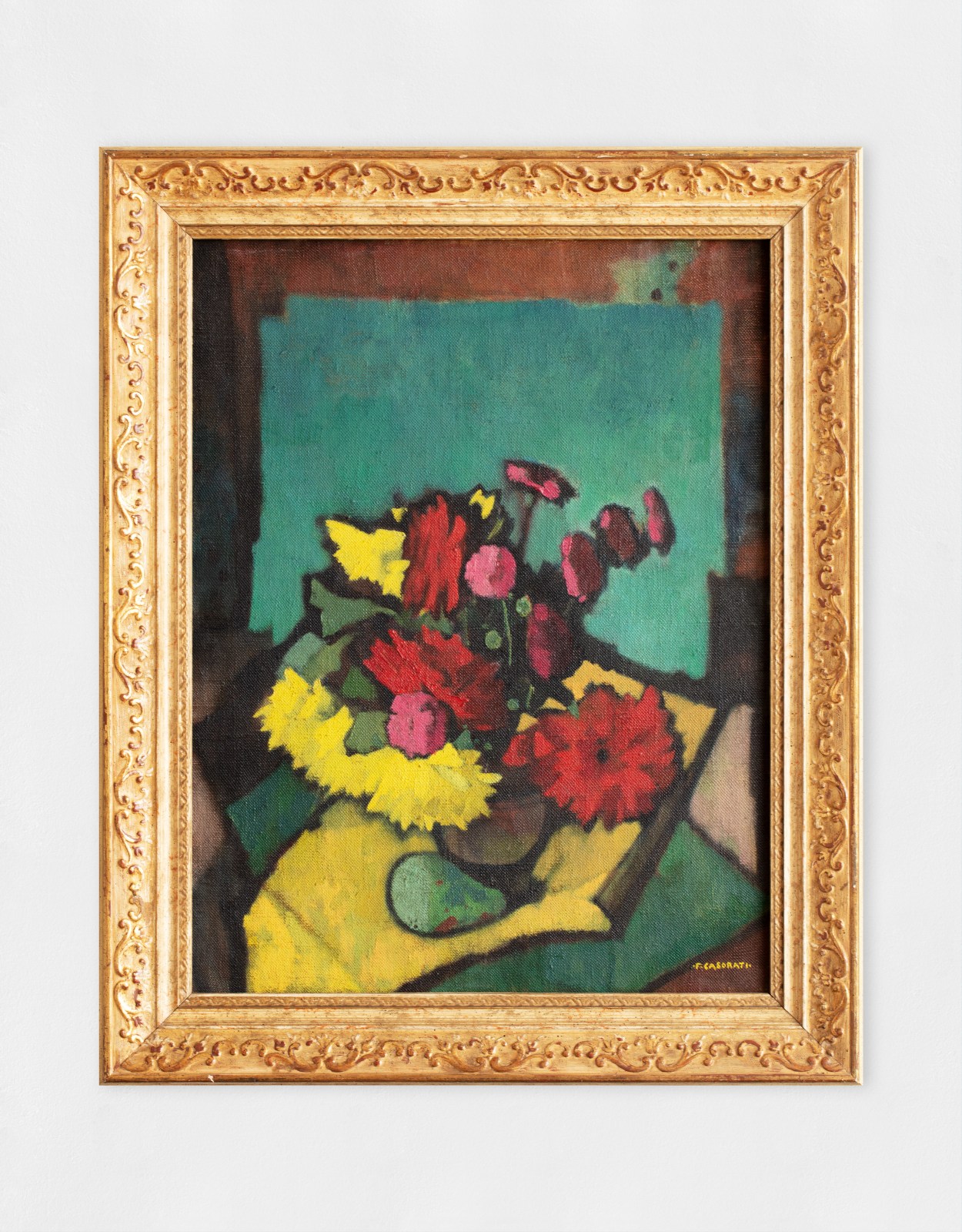An oil painting of abstract flowers in red, pink and yellow against a green and brown background.