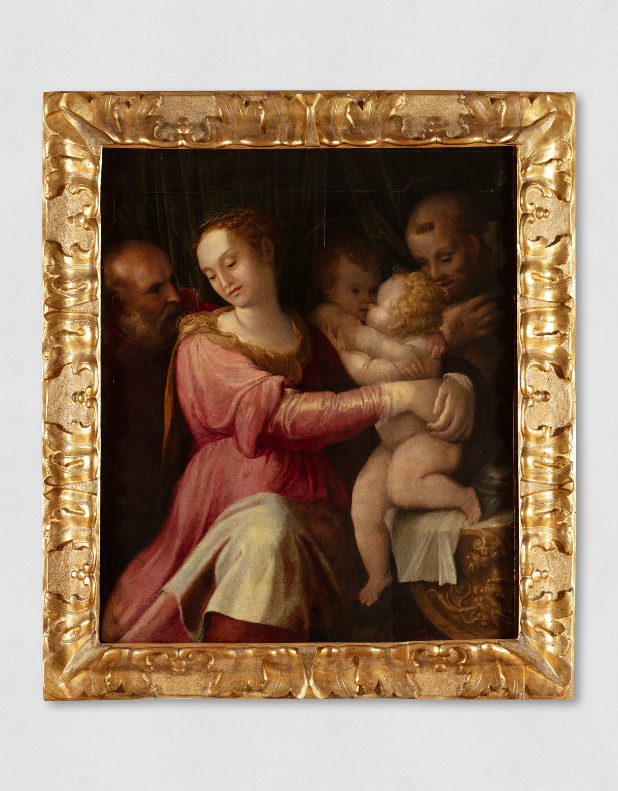 Painting depicting the Holy Family with St. John and St. Francis