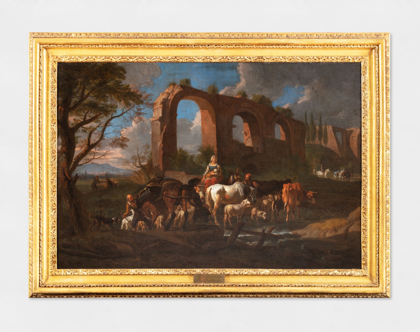 An oil painting of a landscape with figures and aqueducts.