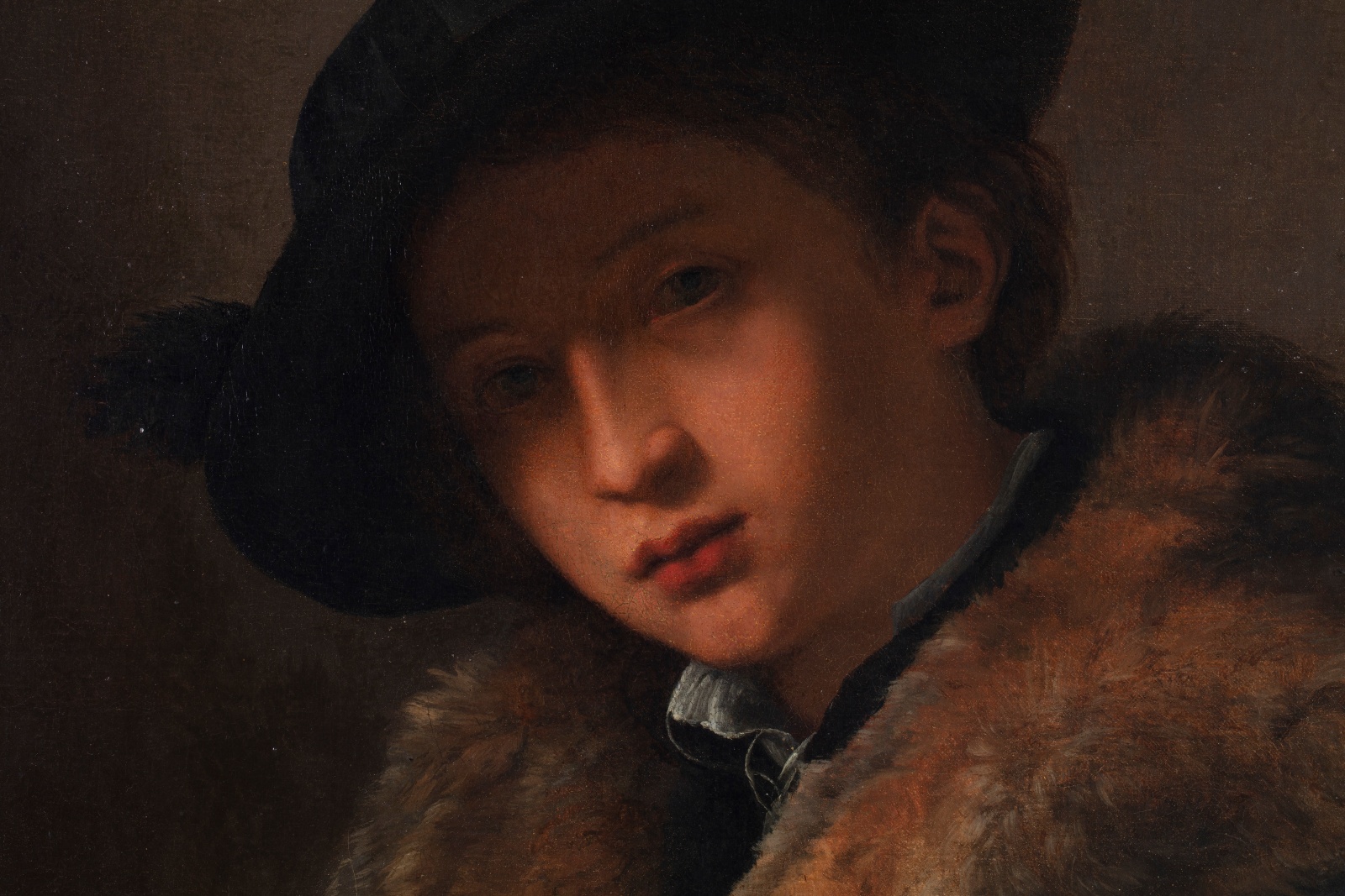 Detail of painting depicting the face of a young boy