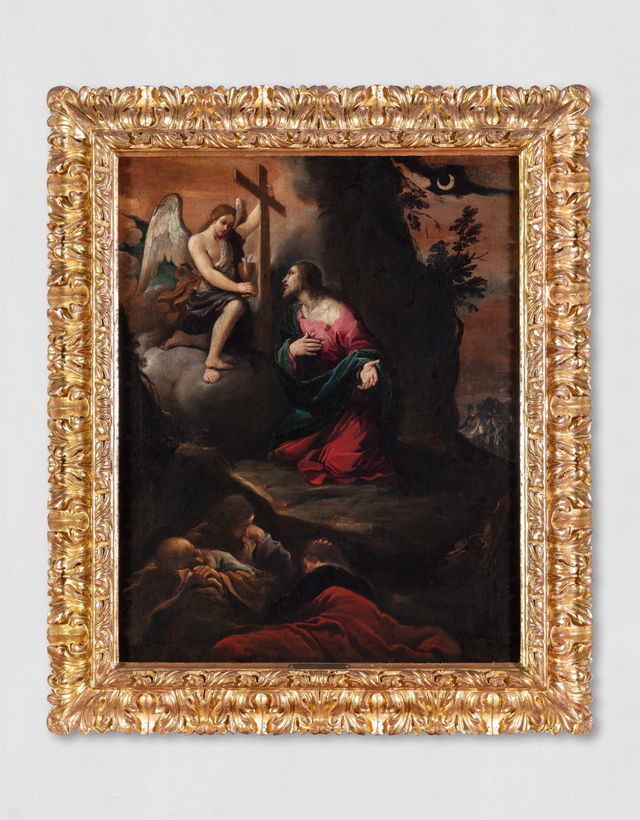 Painting of Christ in the Garden of Gethsemane, looking towards an angel handing him a cross.