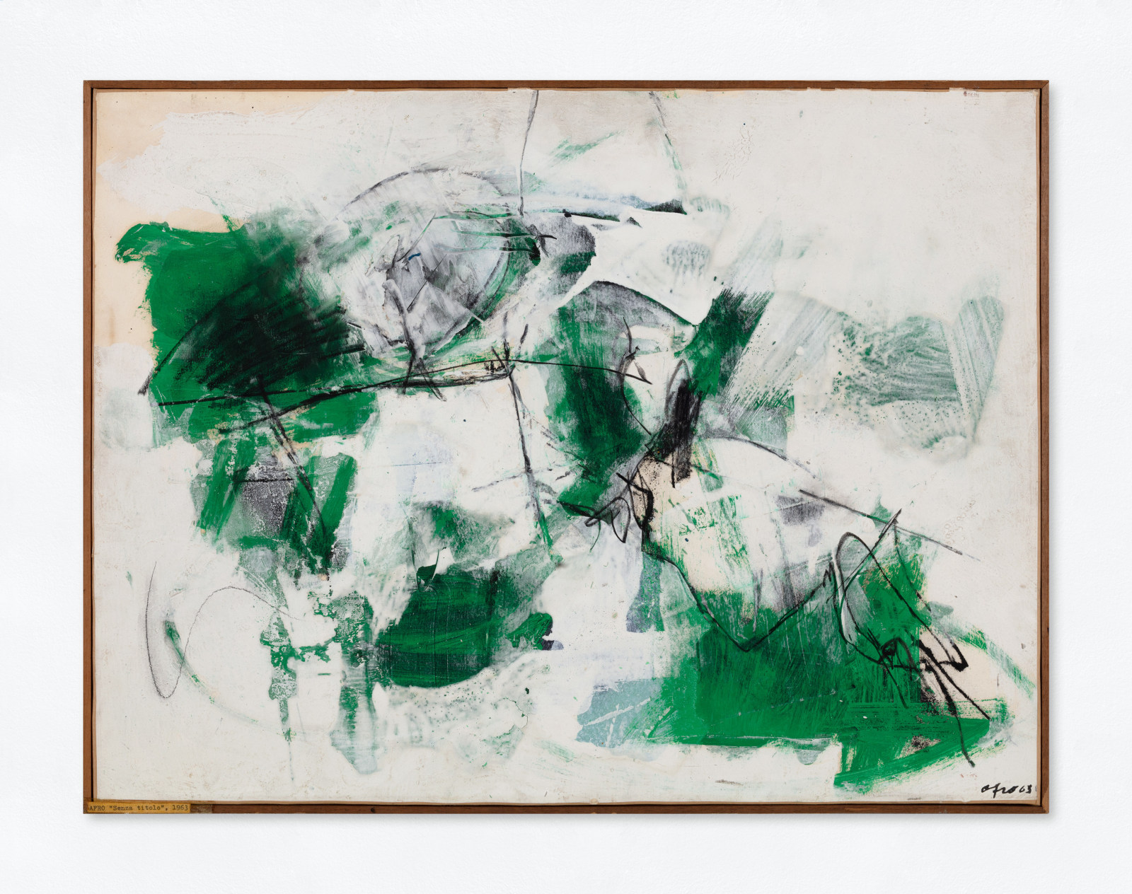 An oil paint and mixed media abstract composition in green, white, and black. Artwork details: Artist: Afro Basaldella. Artwork title: Composizione verde. Artwork year: 1963. Artwork medium: Oil and mixed media. Artwork dimensions: 48 x 63 cm.