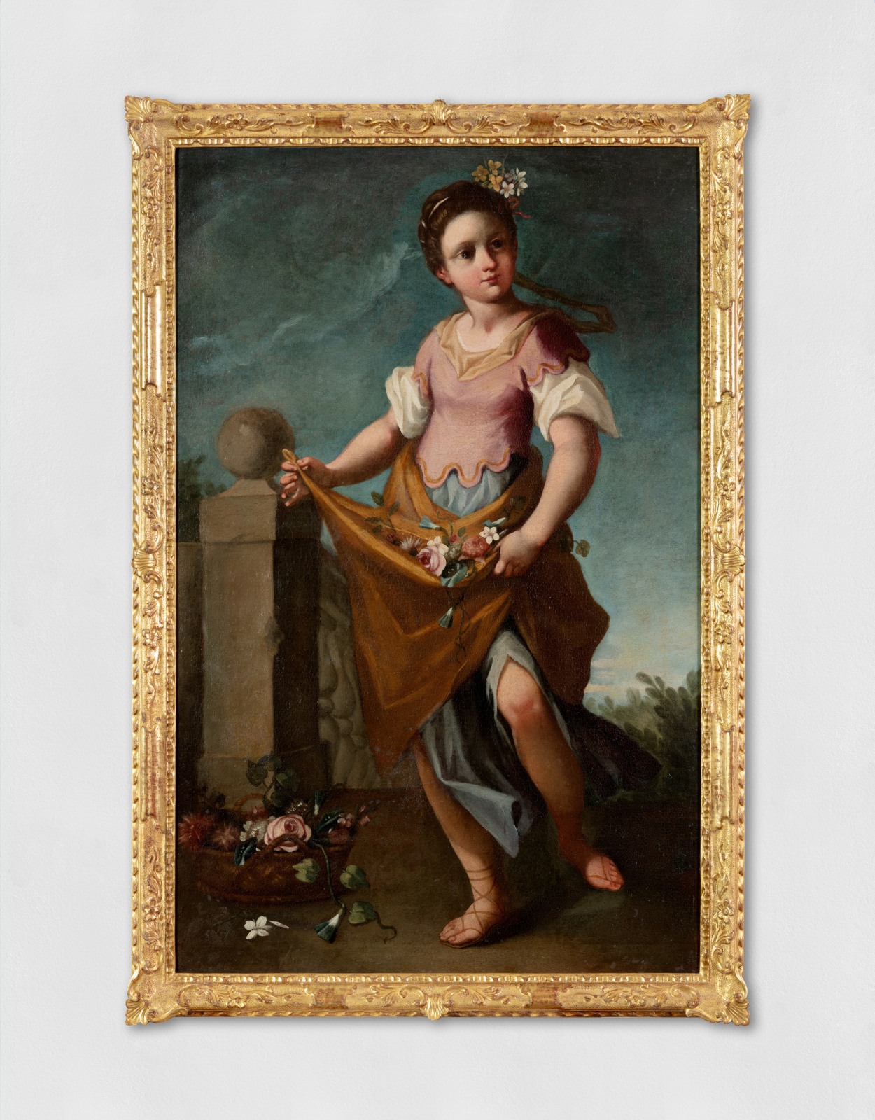 An oil on canvas painting of a young girl with flowers in her hair and a dark blue background.