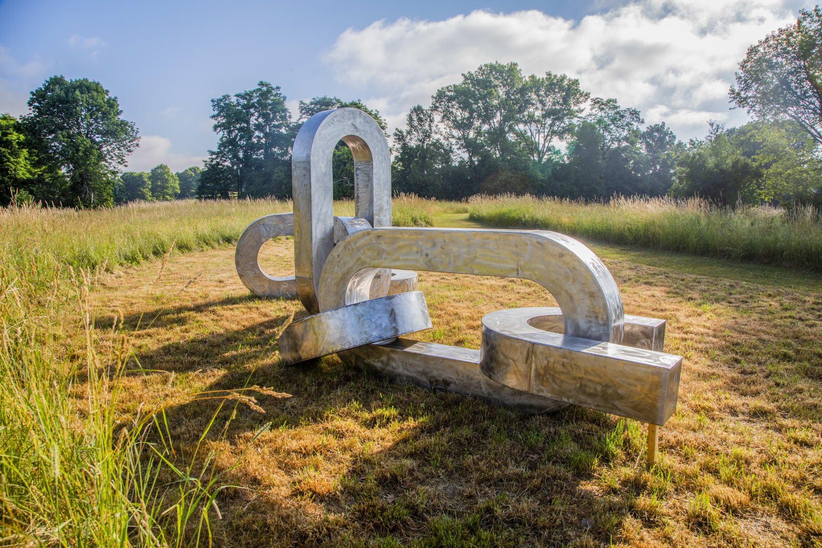 <div class="additional_caption">'Song of the Broken Chains', 2020. Stainless steel. Approx. 243.84 x 548.64 x 365.76cm (96 x 216 x 144in)</div>