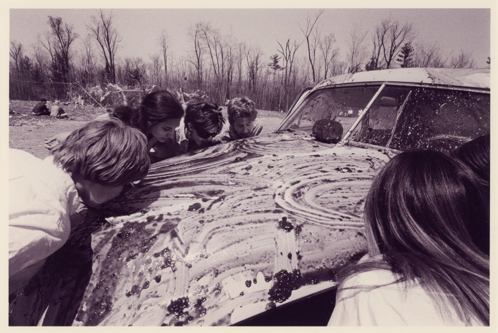 Sol Goldberg's photograph of women licking jam off a car in Allan Kaprow's Household 1964 © The Estate of Sol Goldberg/ Getty Research Institute, Los Angeles