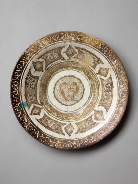 <span class="title"><em>A lustre-painted dish with addorsed birds</em>, c. 1150-1200</span>
