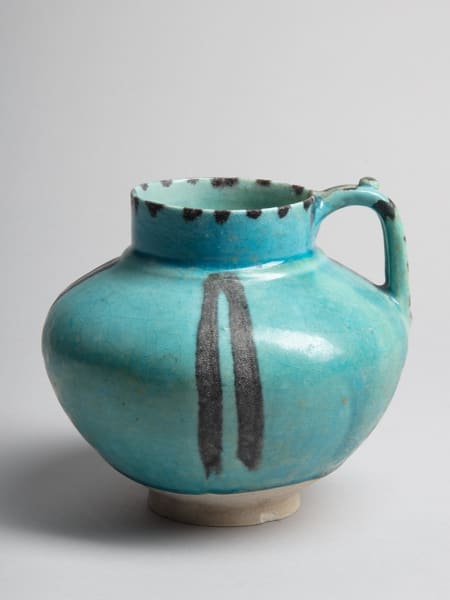 <span class="title"><em>A jug painted in black under a vibrant turquoise glaze, Iran, probably Kashan</em>, c. 1200-1220</span>