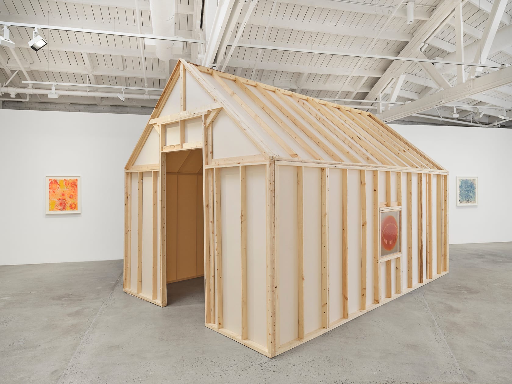 Oscar Tuazon Words for Water, 2024 Wood, canvas, video, glass, paint, folding chairs Dimensions variable