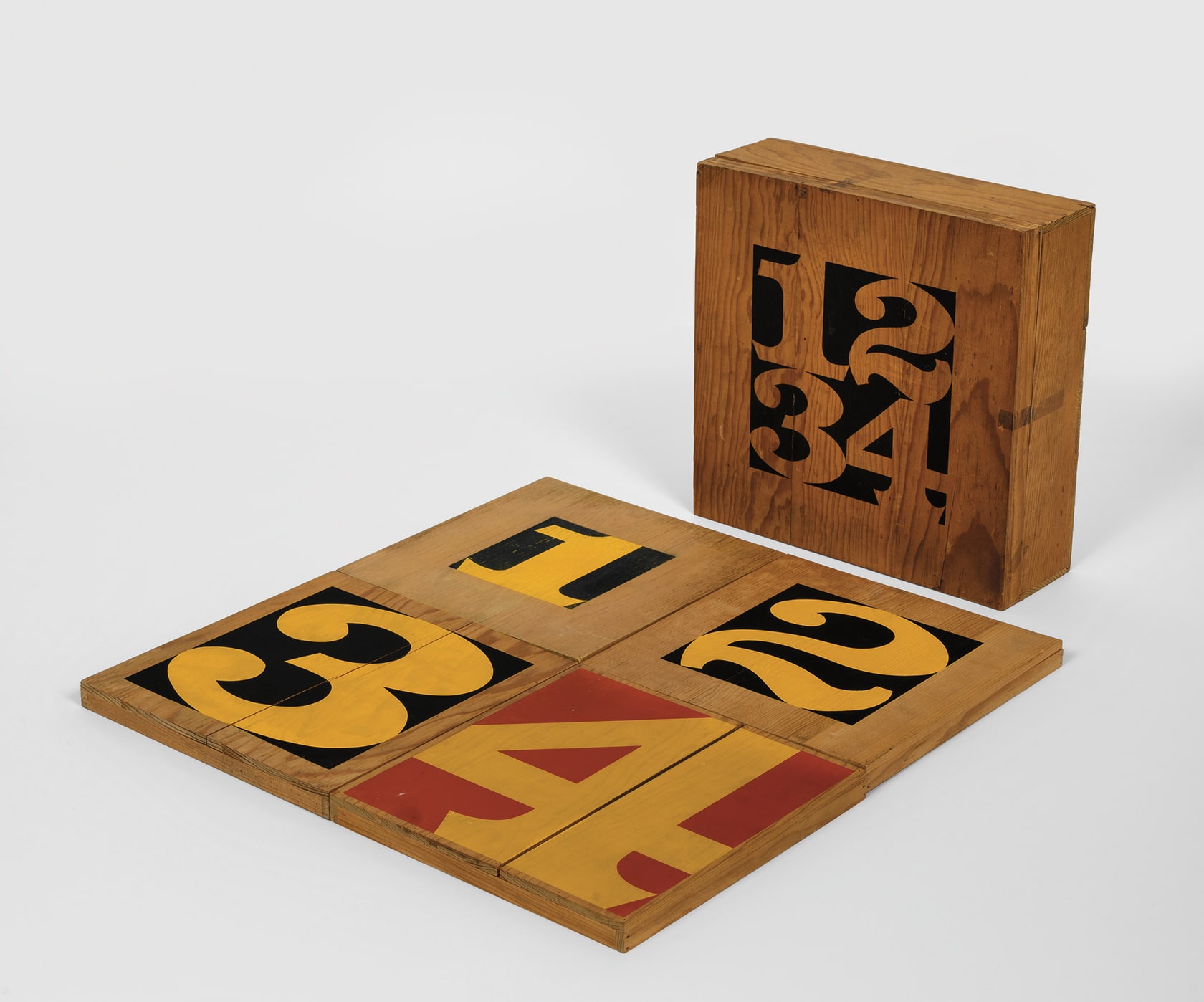 Robert Indiana Exploding Numbers Box, 1966 Screenprint on wood, 4 boards, in wooden box with screenprinted cover Box: 3 5/8...