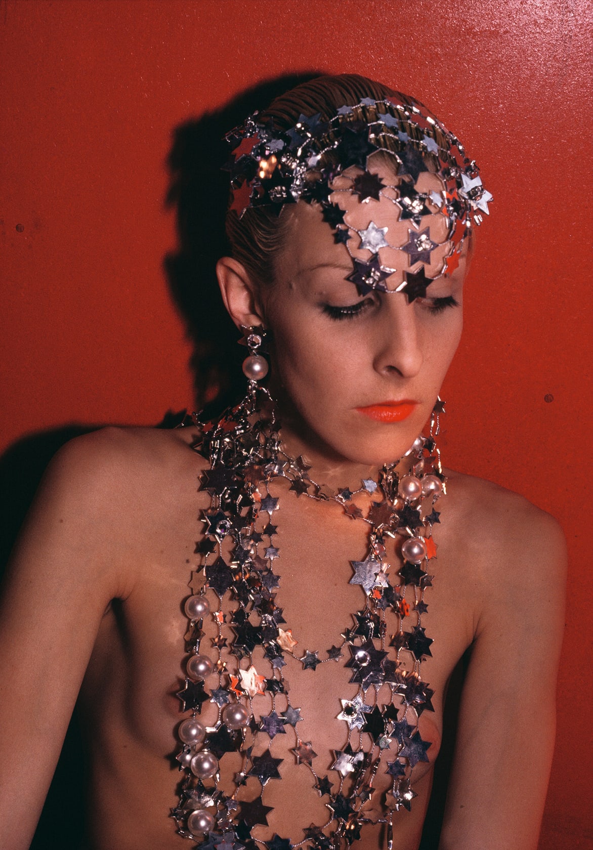 Nan Goldin Greer modeling jewelry, NYC, 1985