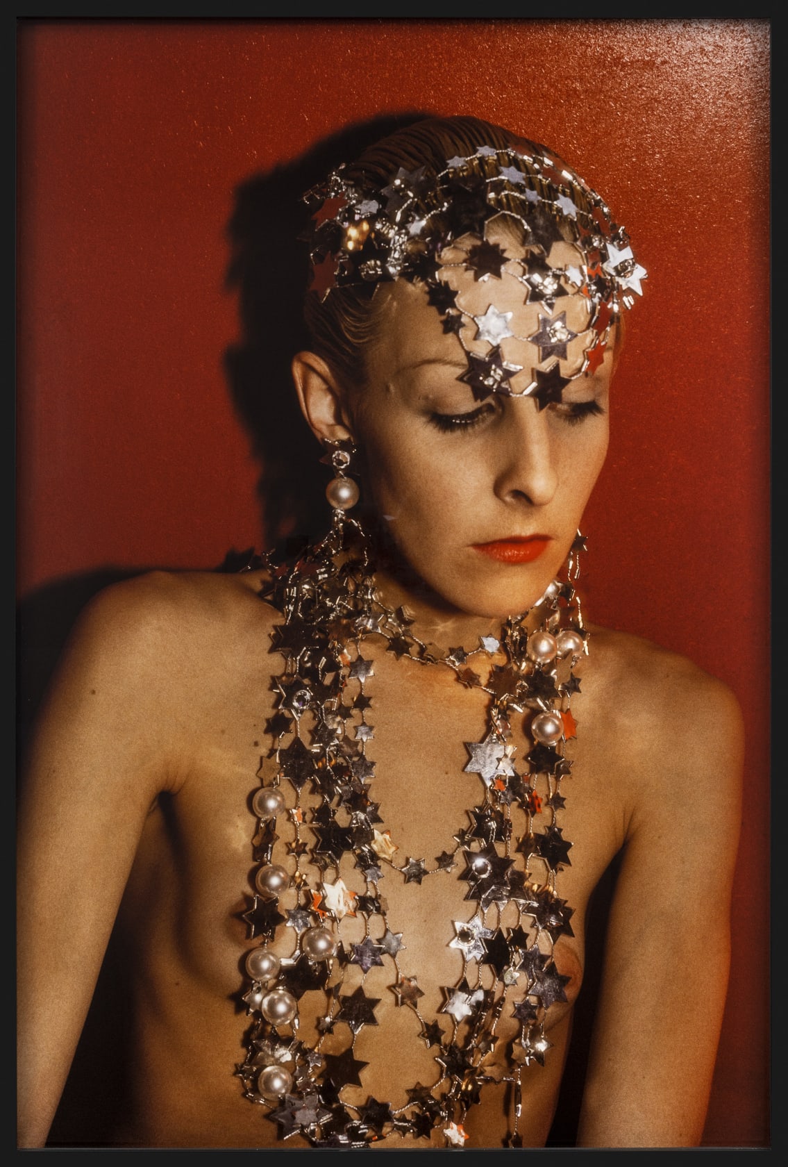 Nan Goldin Greer modeling jewelry, NYC, 1985