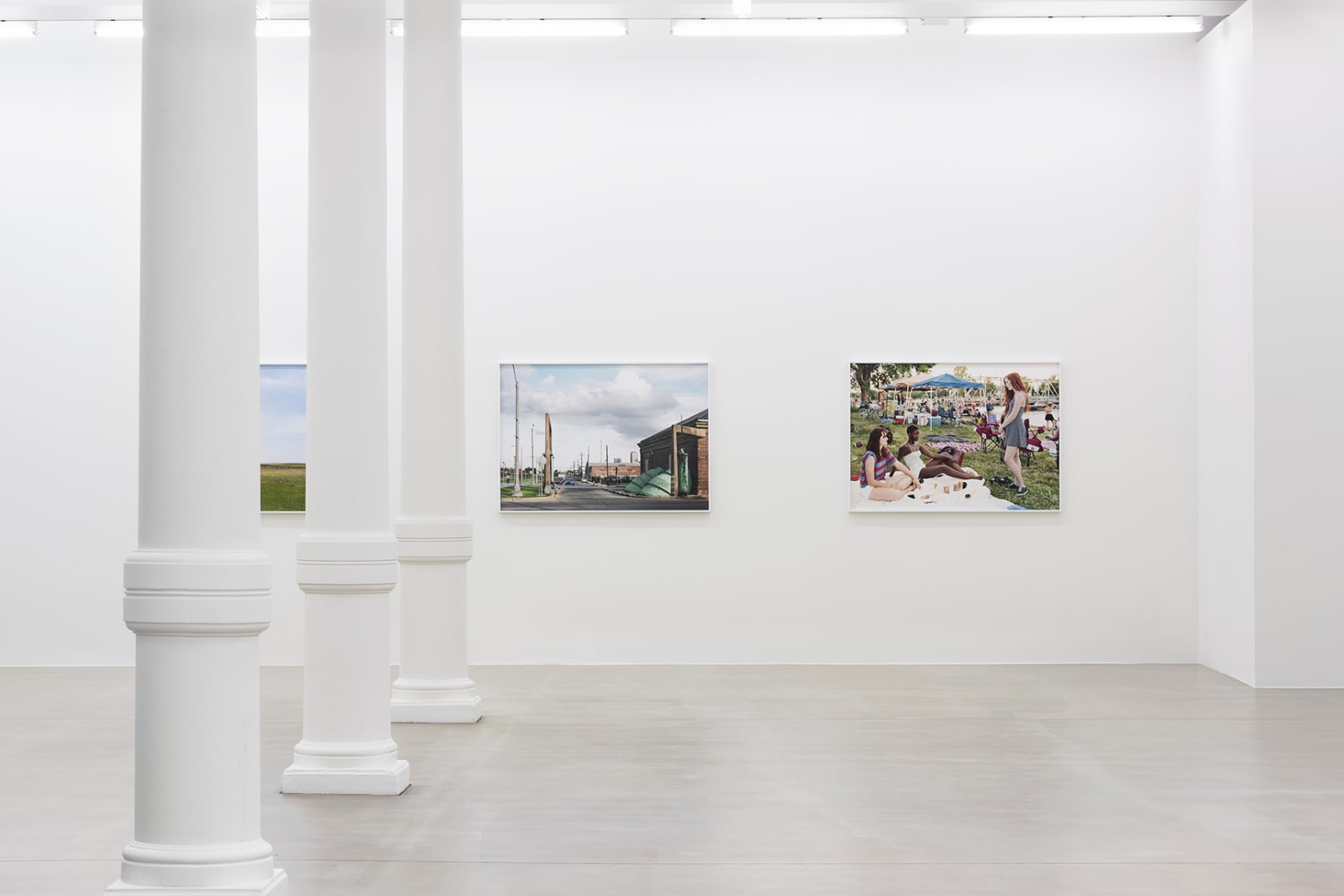 installation view of photographs by An-My Le