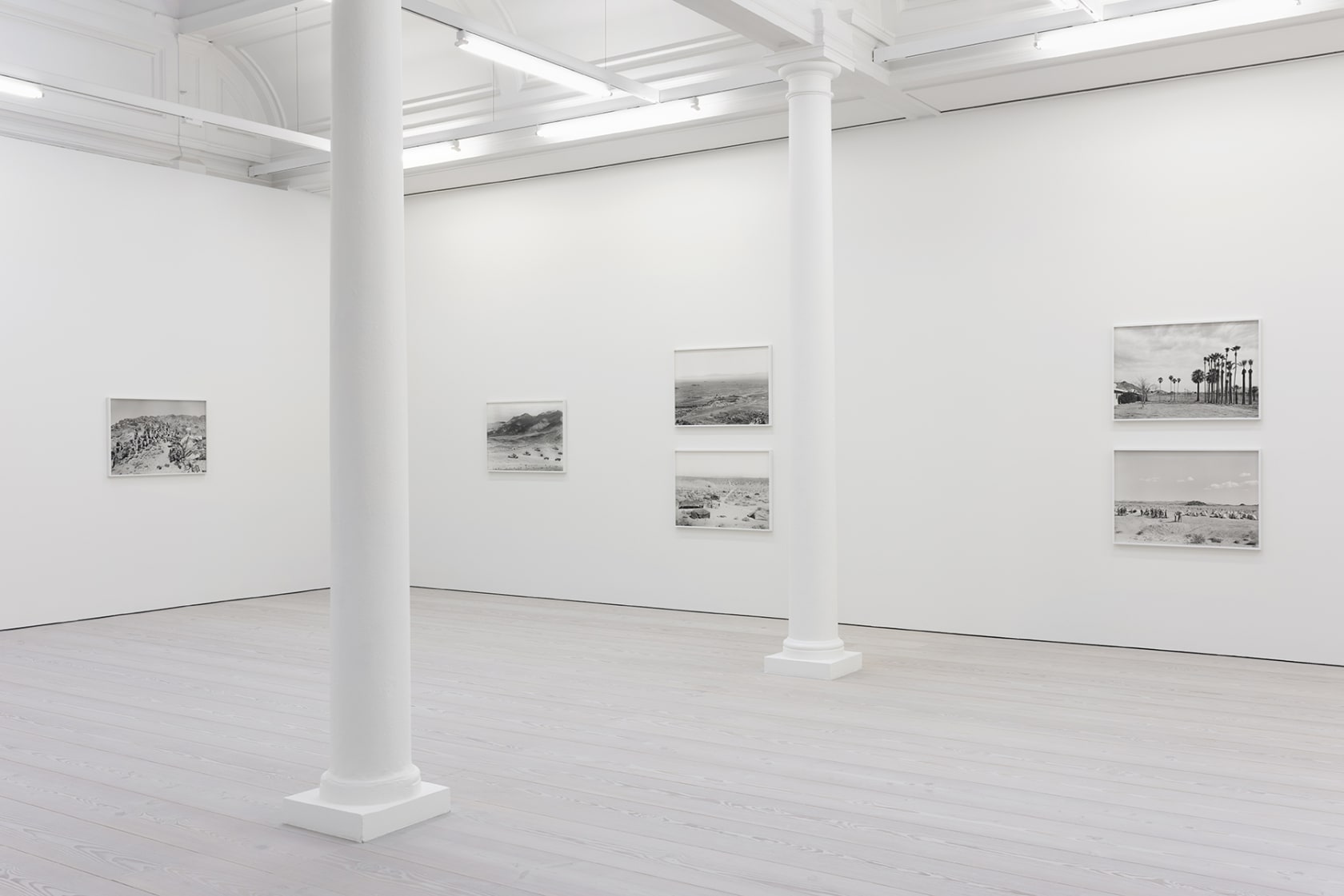 installation view of photographs by An-My Le