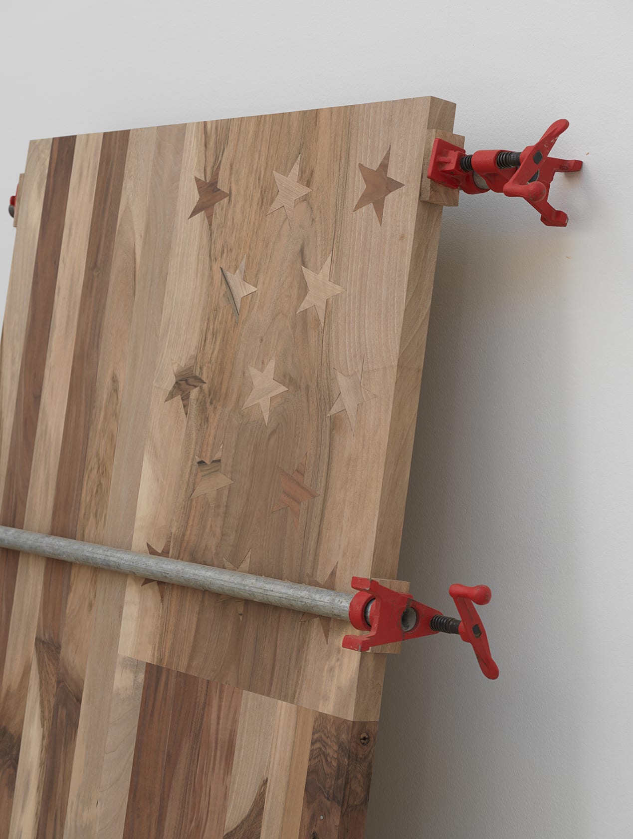 Install view of wooden American flag.