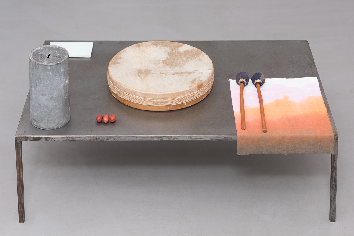 Ulla von Brandenburg It has a Golden Yellow Sun and an Elderly Grey Moon2015 Metal table, drum, drum sticks, dyed...