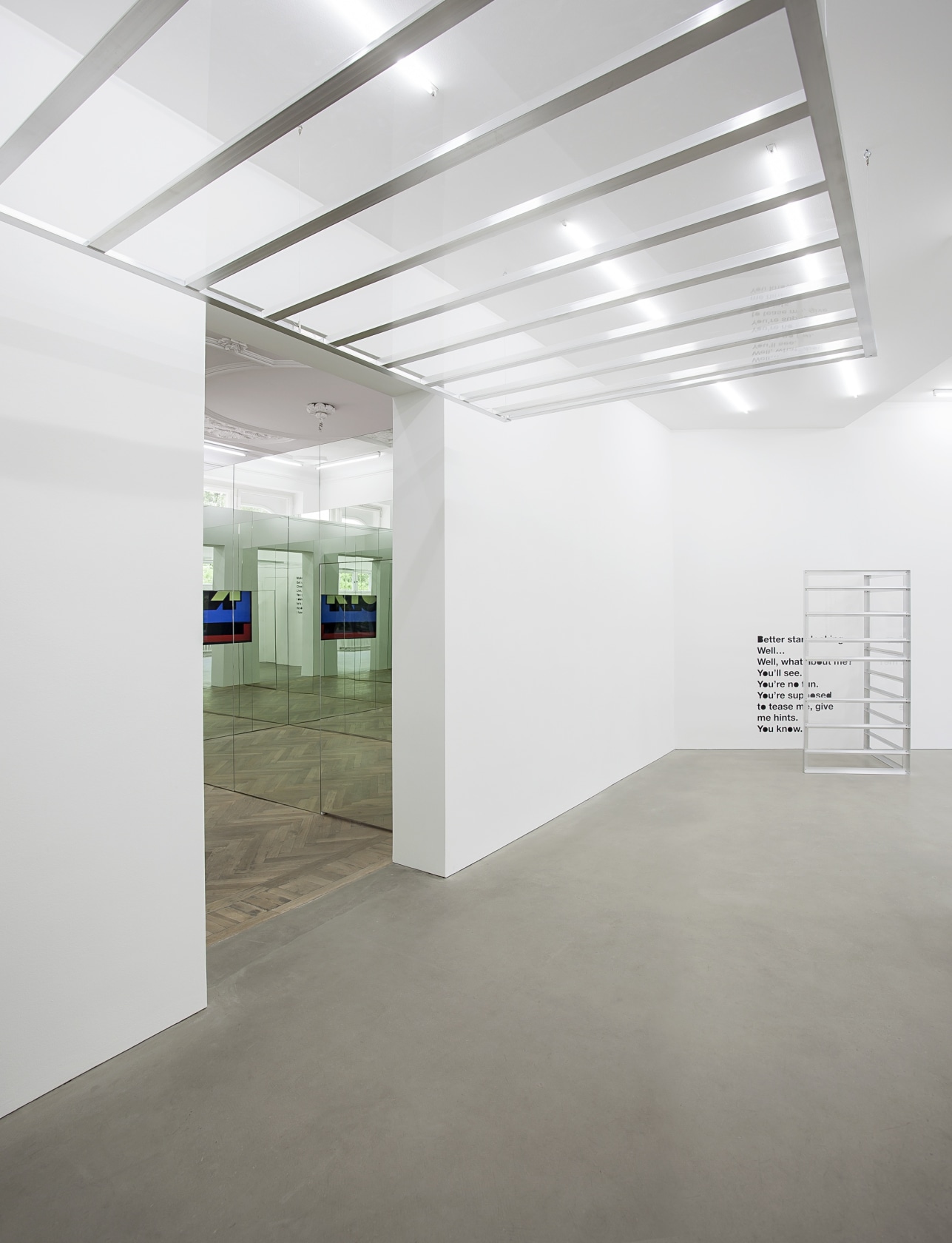 Standard Reference Platform, 2014 (ceiling, detail) Angled Reference Screen, 2014 (back) Both works: raw aluminium, clear Plexiglas, vinyl letters The...